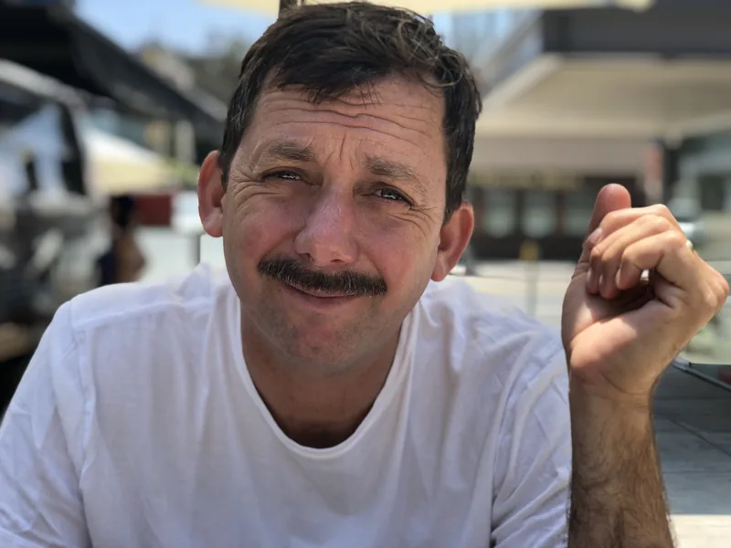 Alex Hoerner, fine art and editorial photographer, in a casual portrait outdoors