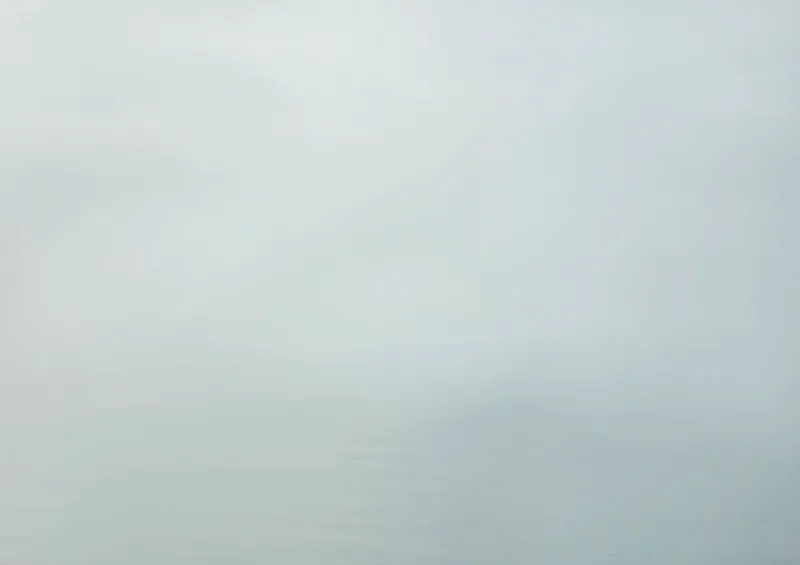 Untitled V — pale gray-blue June Gloom seascape with water barely visible at the bottom of the frame, Santa Monica Bay. Medium format film by Alex Hoerner.